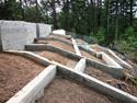 This large hillside foundation required deep drilled concrete piers and large concrete footing.  Once we completed the foundation we started the framing for this great house located in San Geronimo, which is near San Refael in Marin County. 